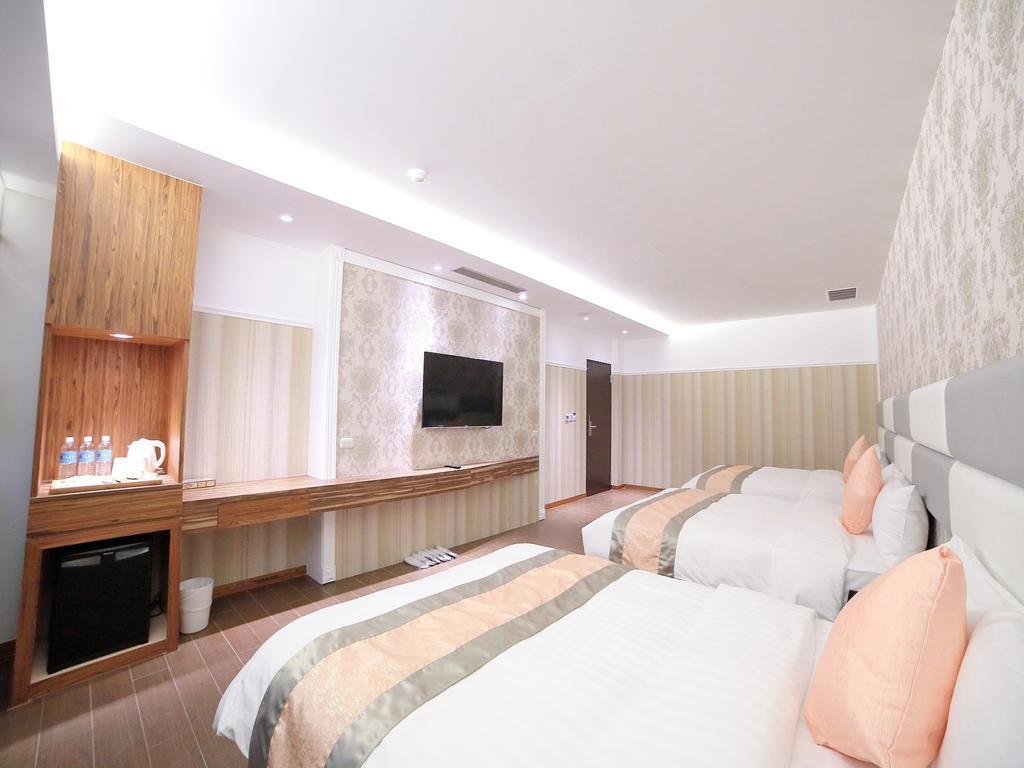 Garden Spring Hotel Джиаоси Стая снимка