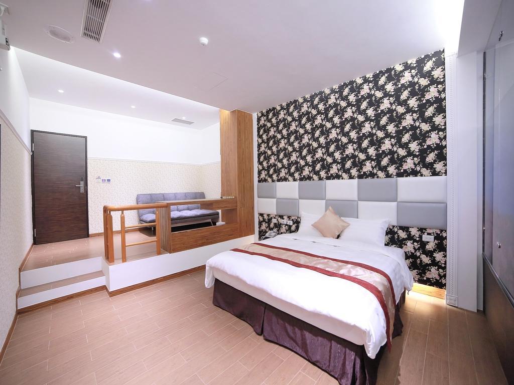 Garden Spring Hotel Джиаоси Стая снимка