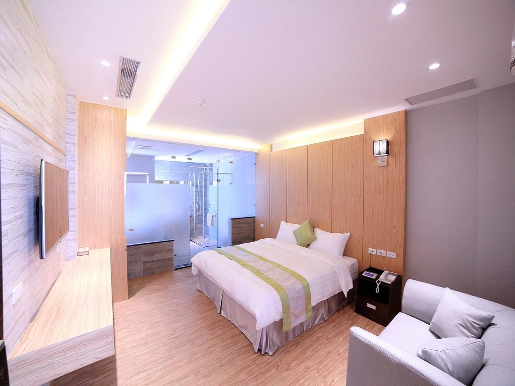 Garden Spring Hotel Джиаоси Стая снимка