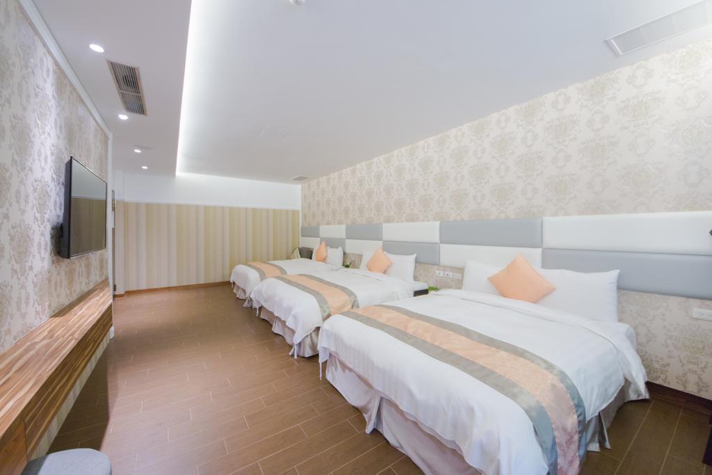 Garden Spring Hotel Джиаоси Стая снимка