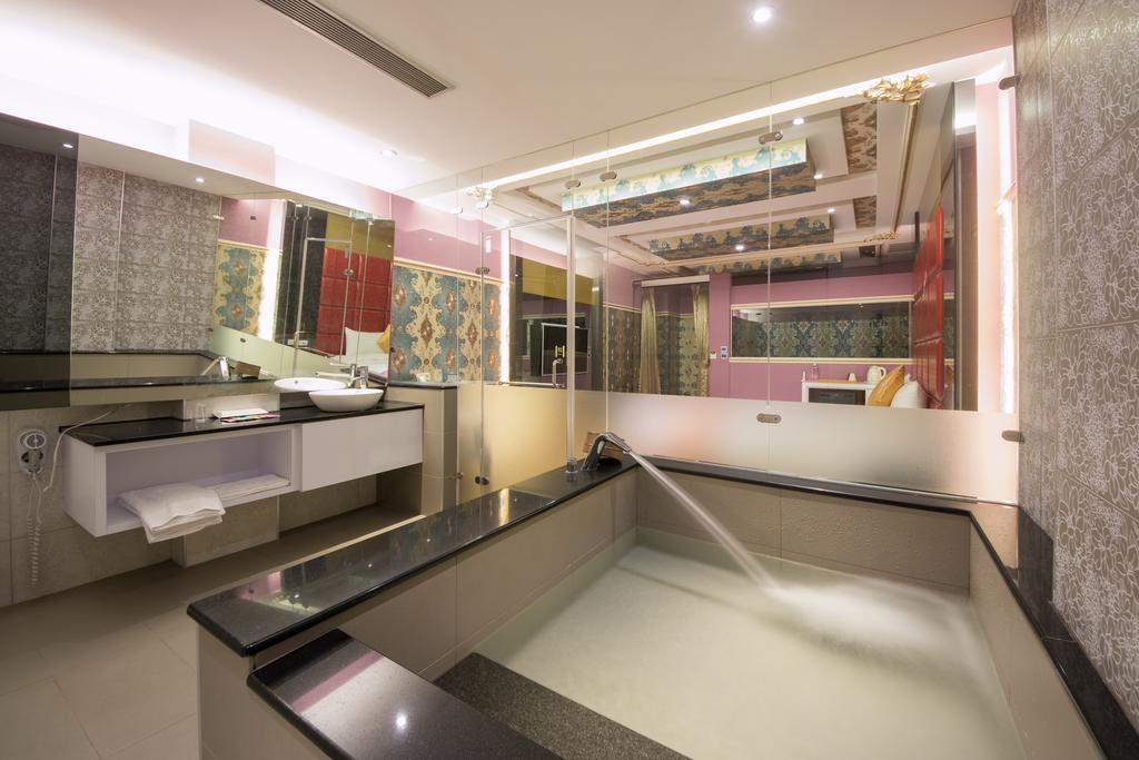 Garden Spring Hotel Джиаоси Стая снимка