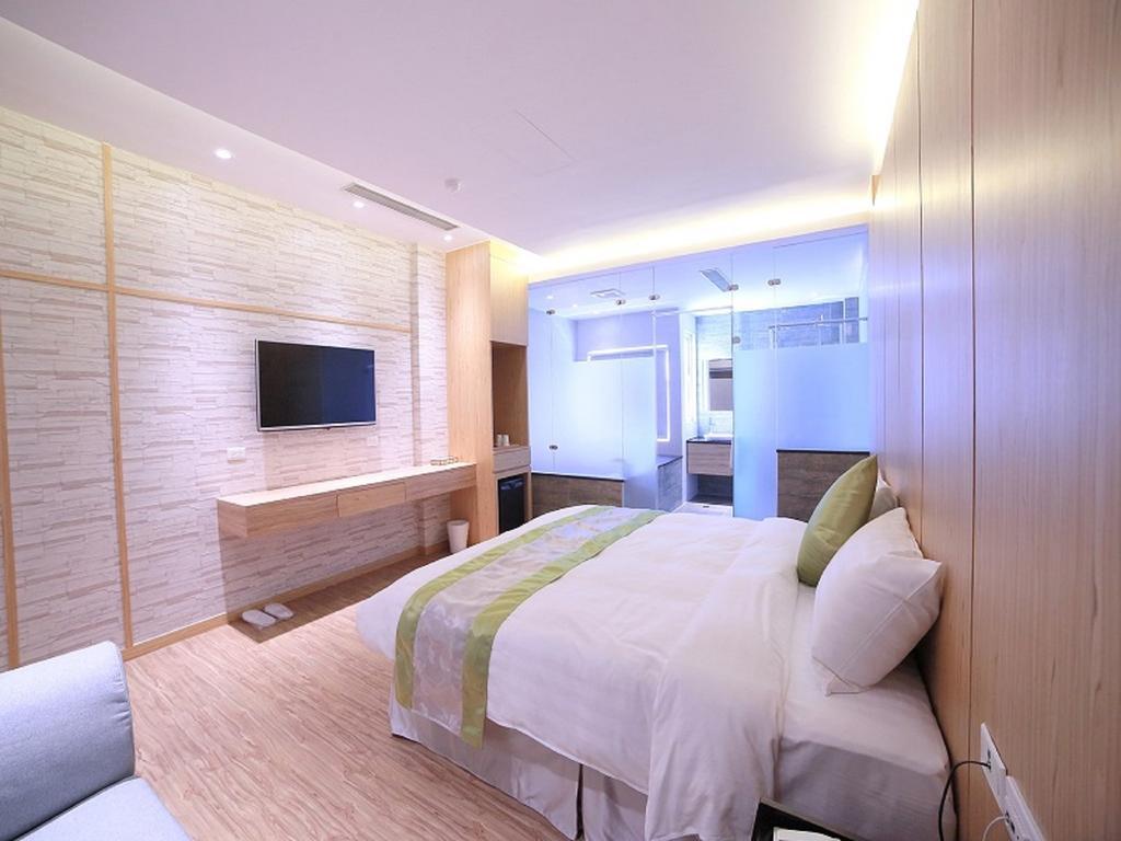 Garden Spring Hotel Джиаоси Стая снимка